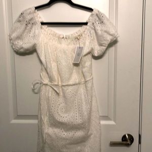 eyelet dress brand . States large however it would fit a medium size.